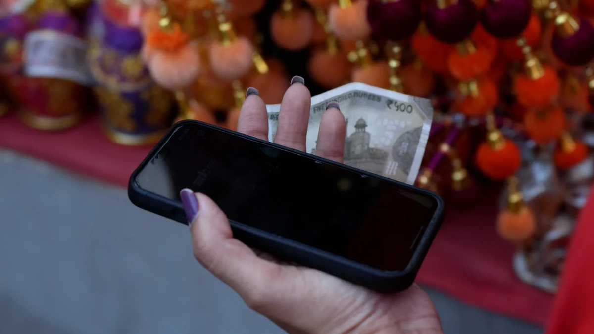 Indian Rupee Finishes Flat Amid Conflicting Market Forces